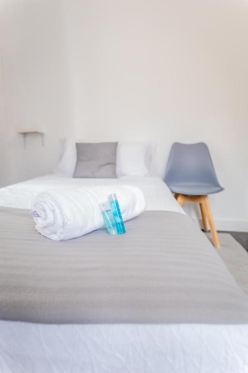 Posteľ alebo postele v izbe v ubytovaní Hostal San Pelayo