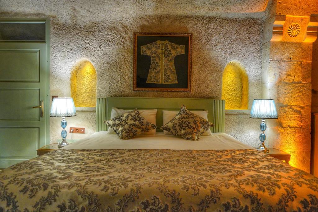 Postel nebo postele na pokoji v ubytování Takaev Cave House