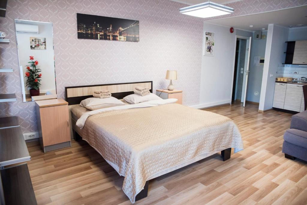 Ένα ή περισσότερα κρεβάτια σε δωμάτιο στο Papiniidu Studio Apartments