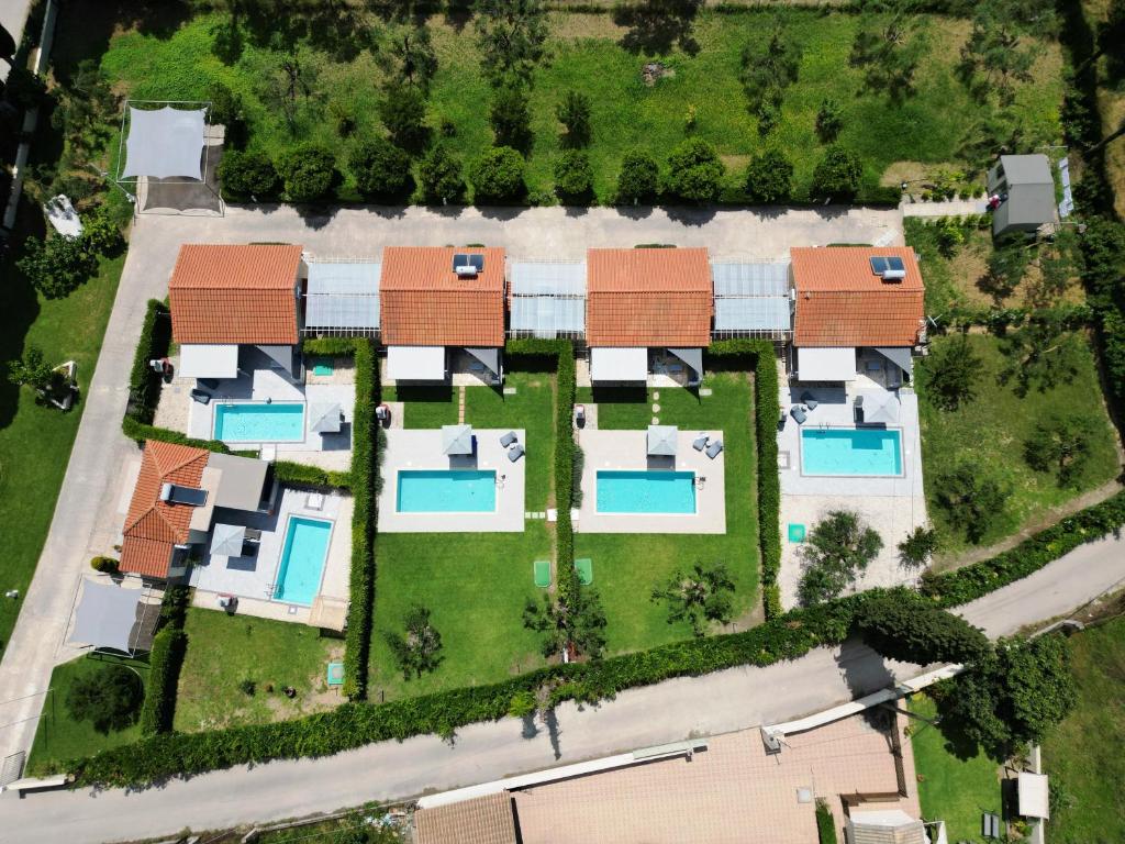 an overhead view of a house with a yard at Cypress Garden Villas in Svoronata