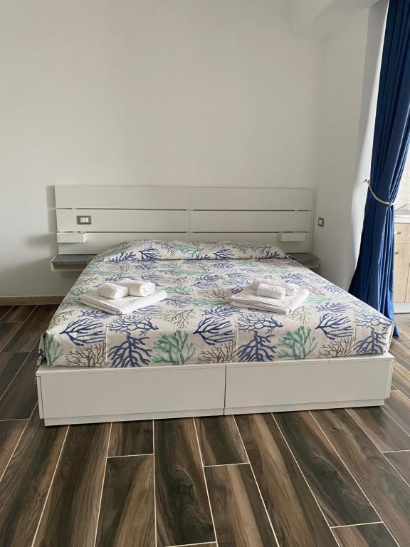 Postel nebo postele na pokoji v ubytování Manfredi Sea Room