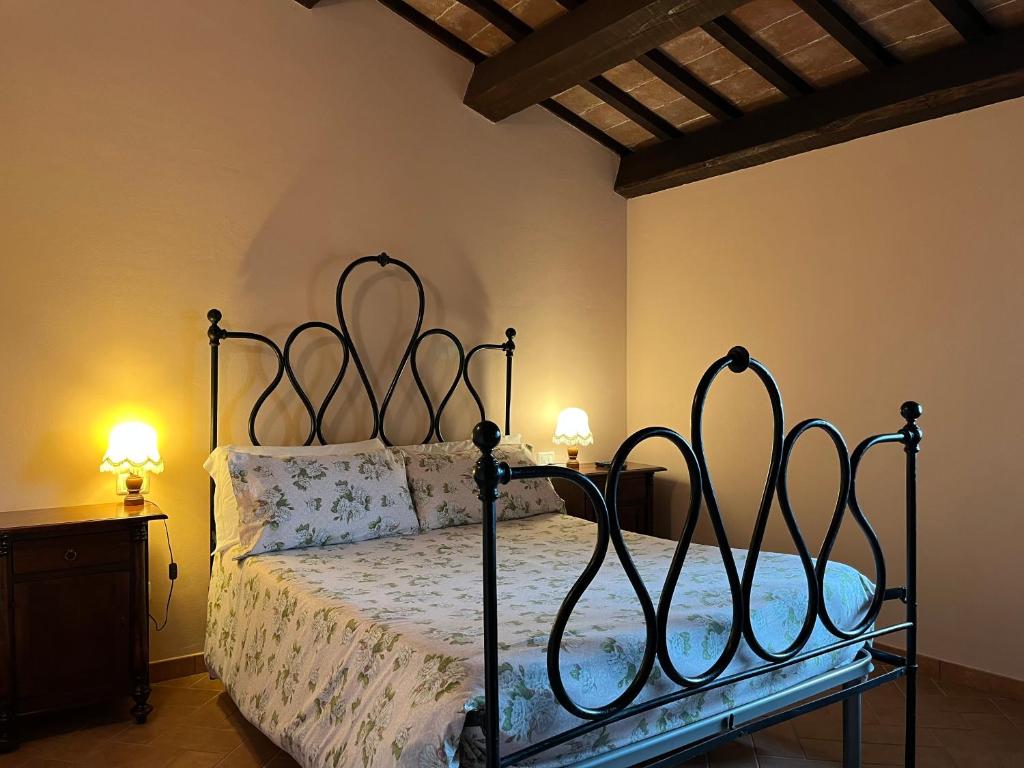 מיטה או מיטות בחדר ב-Agriturismo Le Sorgenti