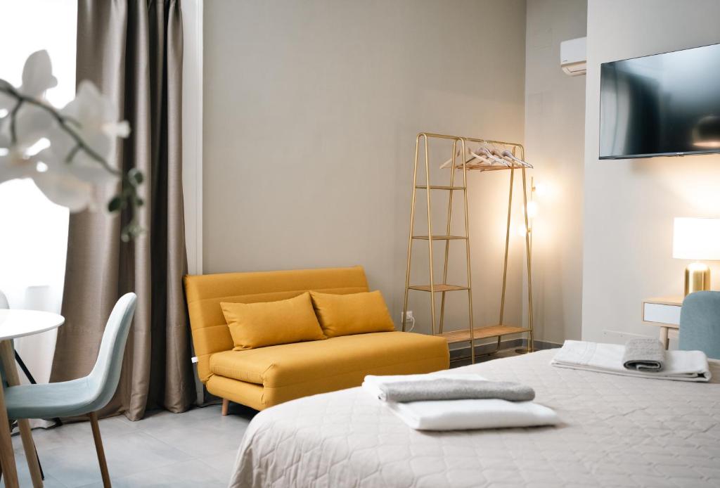 Postel nebo postele na pokoji v ubytování B&B La Pigna