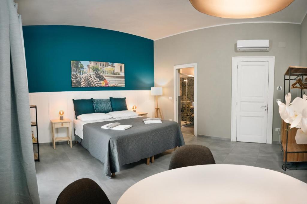 Postel nebo postele na pokoji v ubytování B&B La Pigna