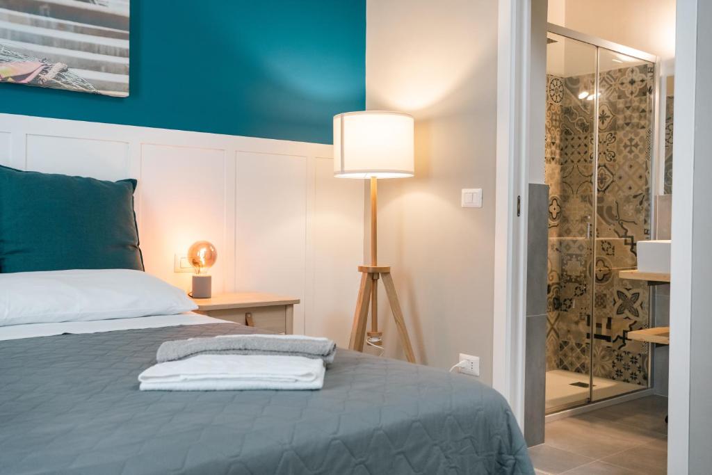 Postel nebo postele na pokoji v ubytování B&B La Pigna