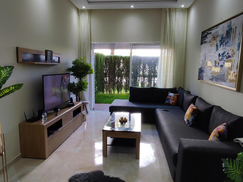 Fotografie z fotogalerie ubytování Appartement bouznika kettani avec jardin privé accés direct à la piscine v destinaci Bouznika