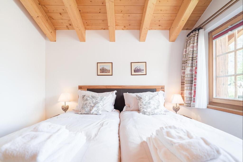 Postel nebo postele na pokoji v ubytování Chalet Ulysse