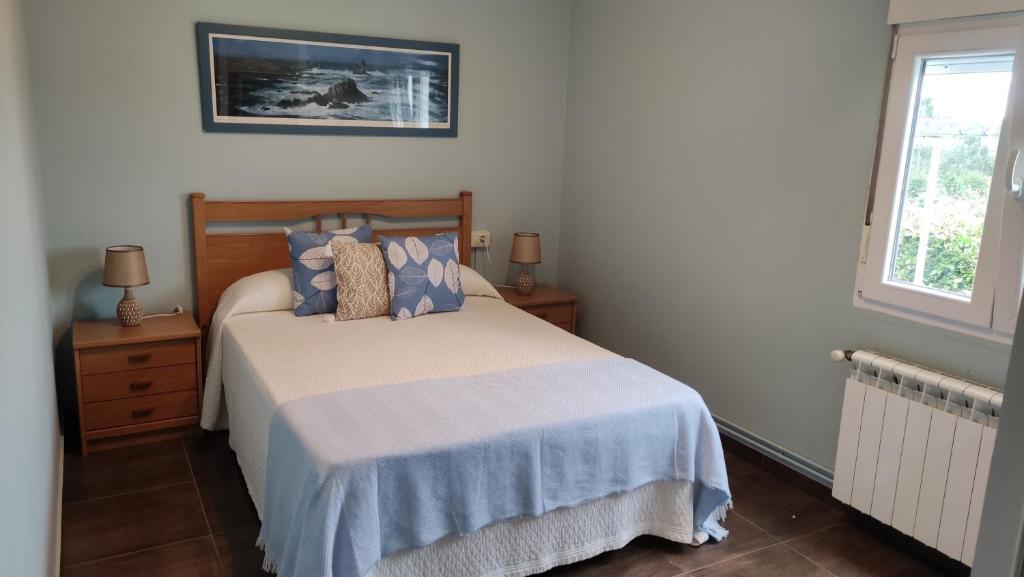 Postel nebo postele na pokoji v ubytování Casa Iris - Paraíso Ortegal