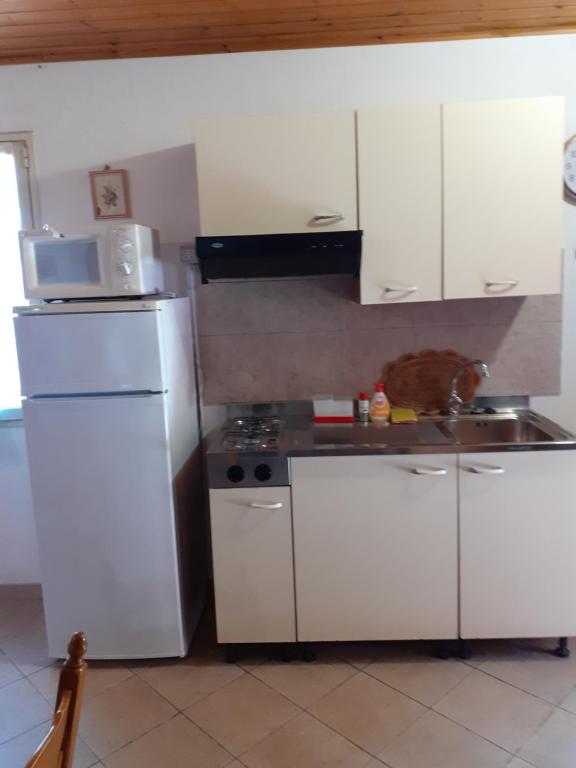 Kuchnia lub aneks kuchenny w obiekcie Casa Solanas new