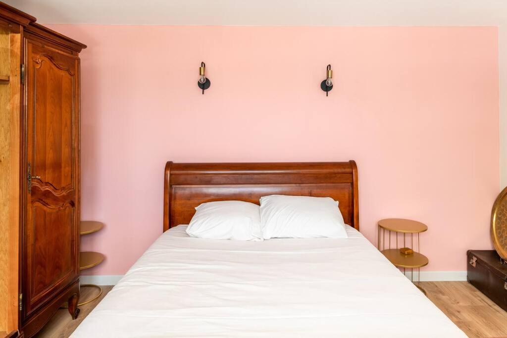 Cama ou camas em um quarto em Ostal p&eacute;rigourdine - Comme &agrave; la maison