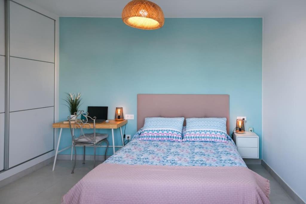 Postel nebo postele na pokoji v ubytování Apartamento Aguamarina Senator