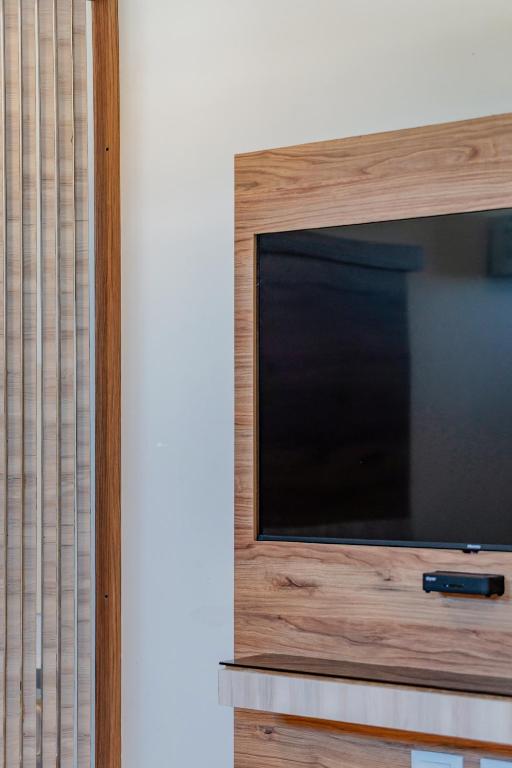 TV a/nebo společenská místnost v ubytování Hotel Central Merida by Kavia