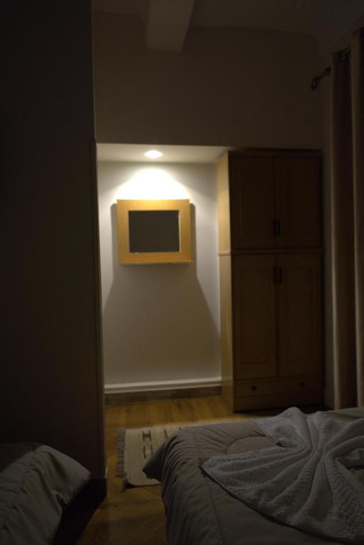 Postel nebo postele na pokoji v ubytování Central Cairo Hotel