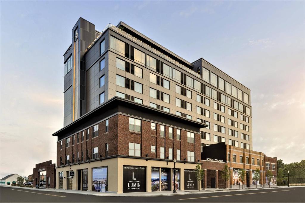 an architectural rendering of a building on a street at AC Hotel by Marriott Columbus Downtown in Columbus