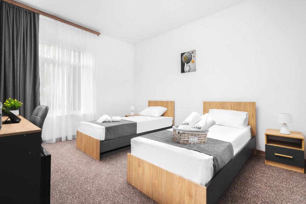 Postel nebo postele na pokoji v ubytování Hotel Arami by Downtown