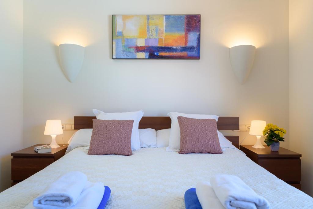 Postel nebo postele na pokoji v ubytování Hipoclub Villas, "Rosa" villa