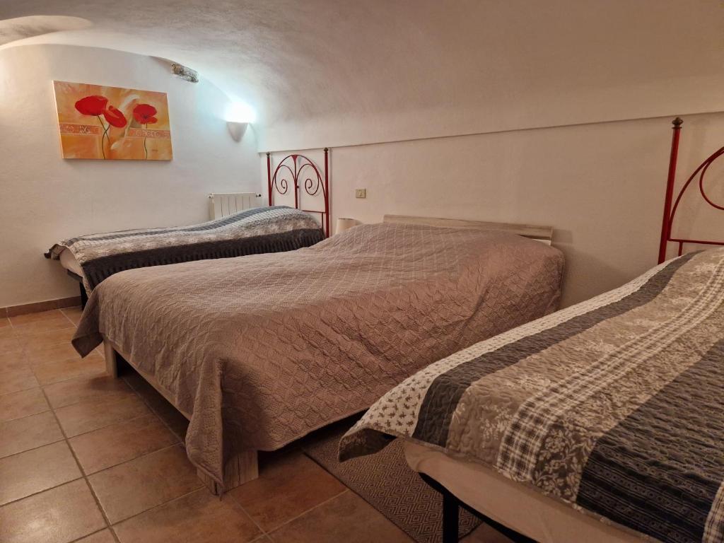 Postelja oz. postelje v sobi nastanitve Casa del Gufo