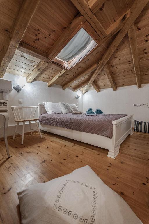 Postel nebo postele na pokoji v ubytování Cicones Boutique Apartments