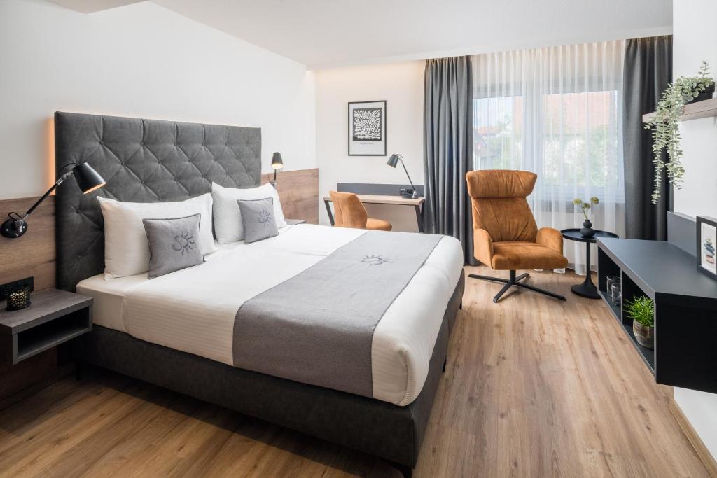 Postel nebo postele na pokoji v ubytování Landhotel Sonne