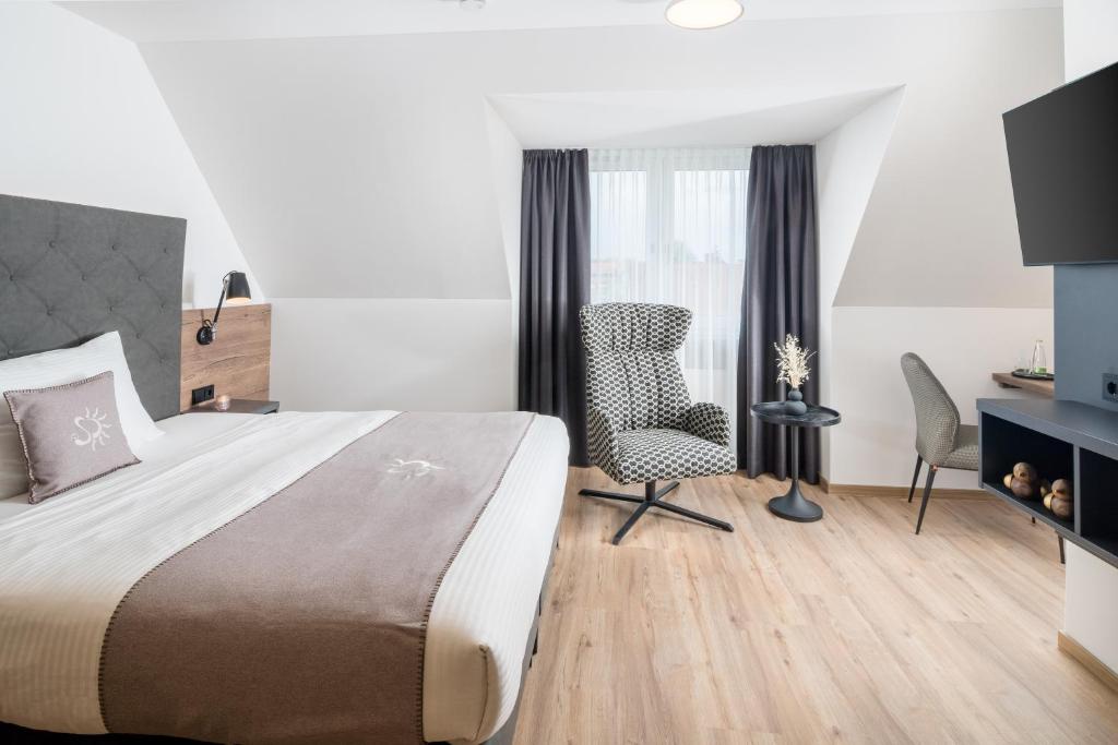 Postel nebo postele na pokoji v ubytování Landhotel Sonne