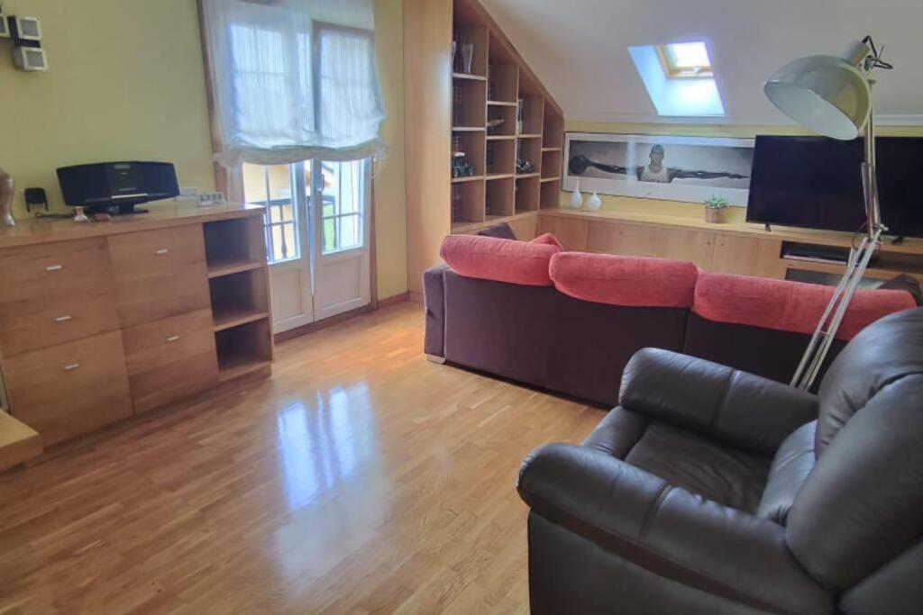 TV a/nebo společenská místnost v ubytování Preciosa casa en Ribadeo