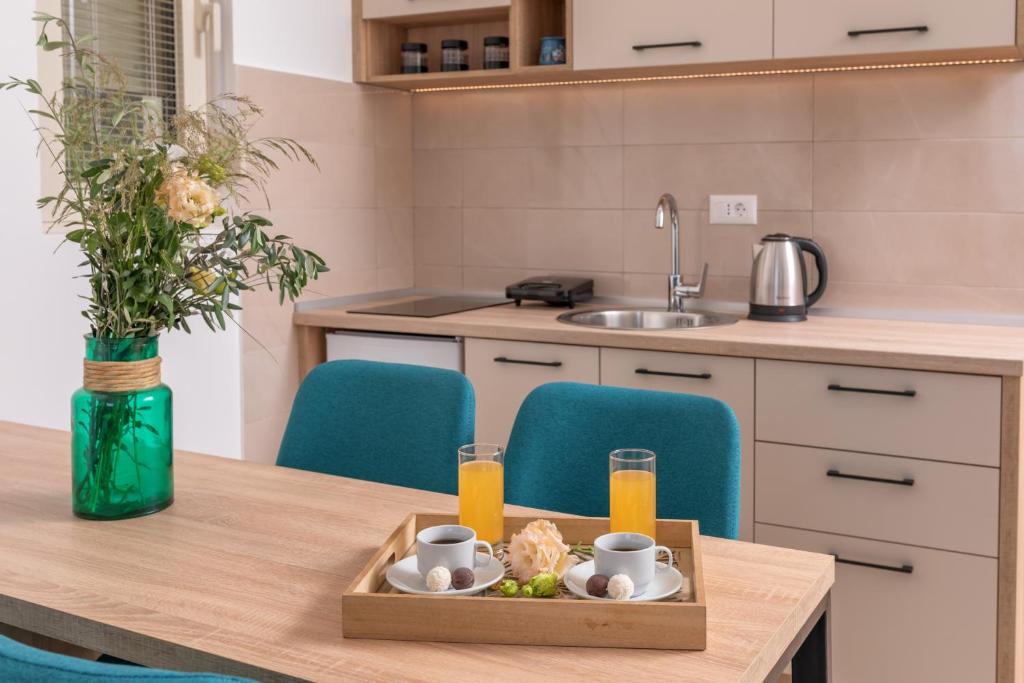 Kuchyň nebo kuchyňský kout v ubytování Apartments Bonazza