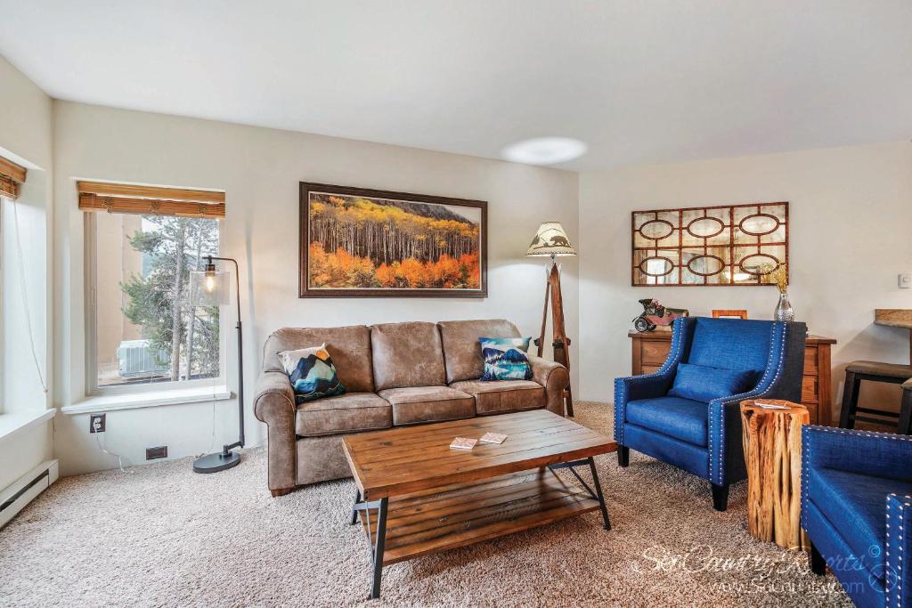 a living room with a couch and two chairs at Views, Hiking Trails Galore, Walk to Main Street From This Perfect Summer Getaway PA203 in Breckenridge