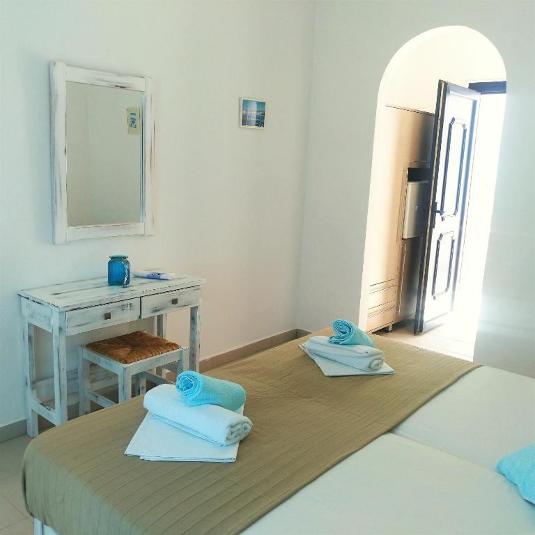 Postel nebo postele na pokoji v ubytování Dolphin Rooms