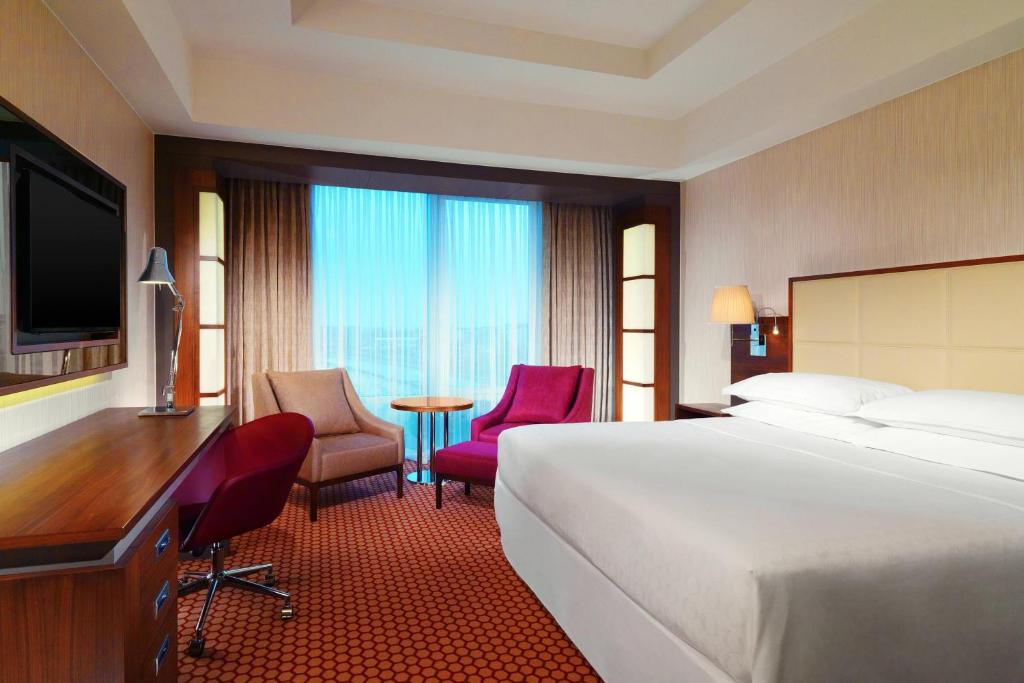 Postel nebo postele na pokoji v ubytování Sheraton Bursa Hotel