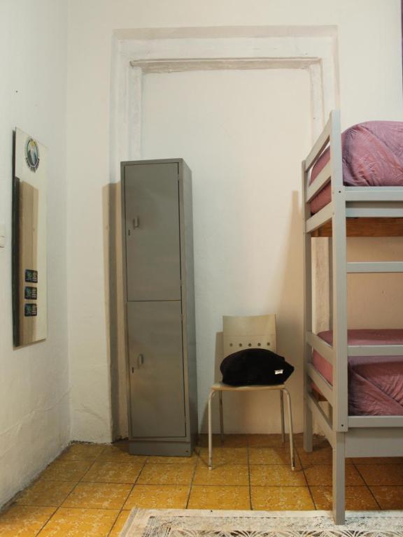 Postel nebo postele na pokoji v ubytování Hostal Centeno