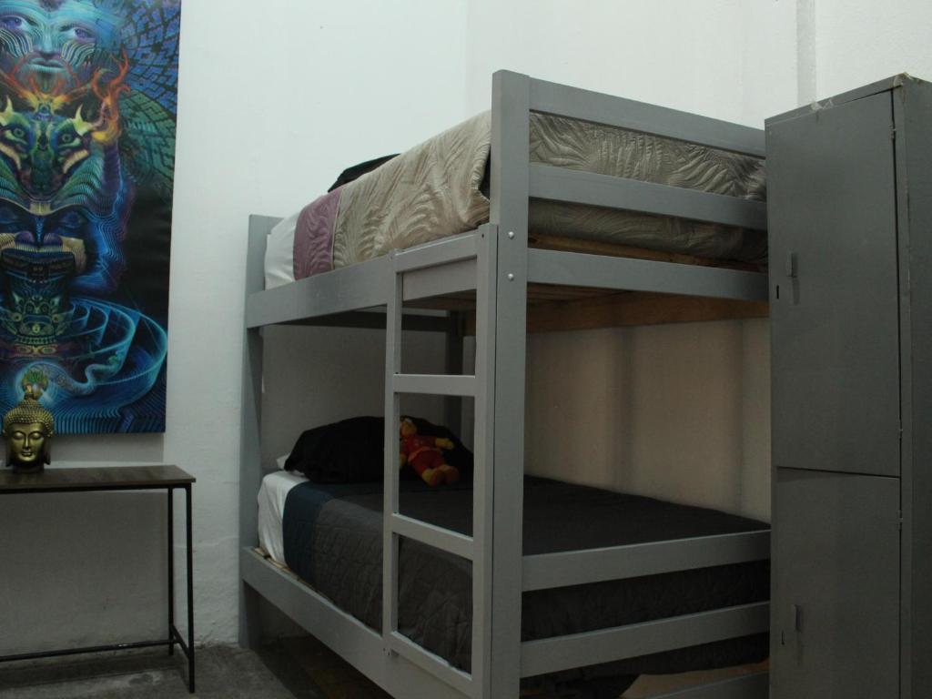 Postel nebo postele na pokoji v ubytování Hostal Centeno