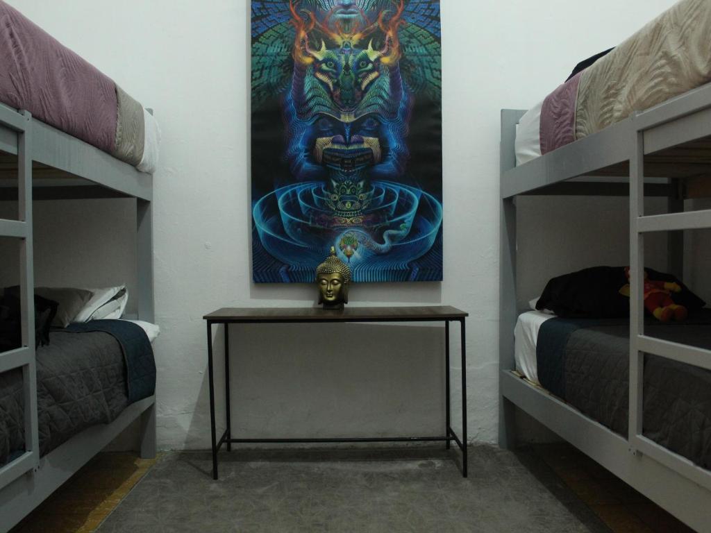 Postel nebo postele na pokoji v ubytování Hostal Centeno