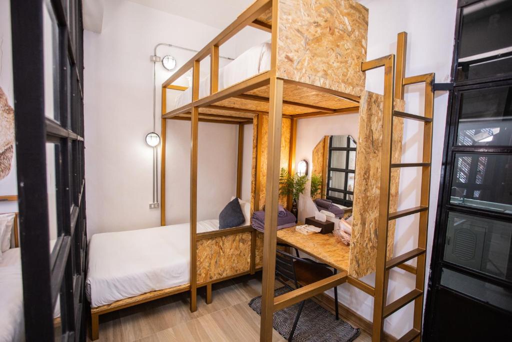 Postel nebo postele na pokoji v ubytování Indiego Space