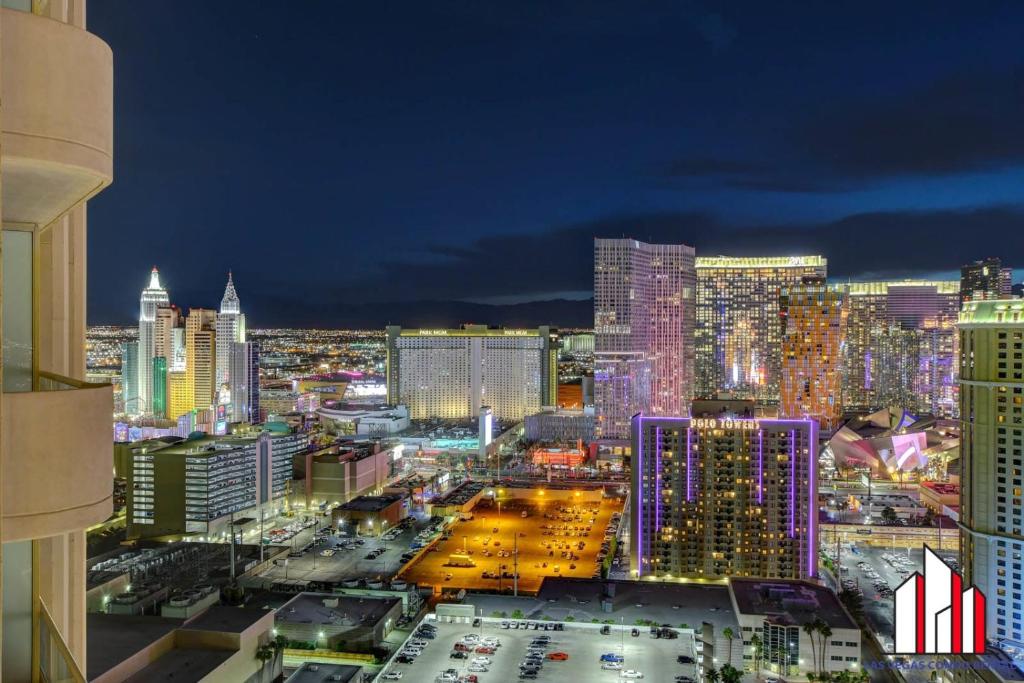 a view of a city skyline at night at MGM Signature-32-621 1Br2Ba F1 Strip View Balcony in Las Vegas