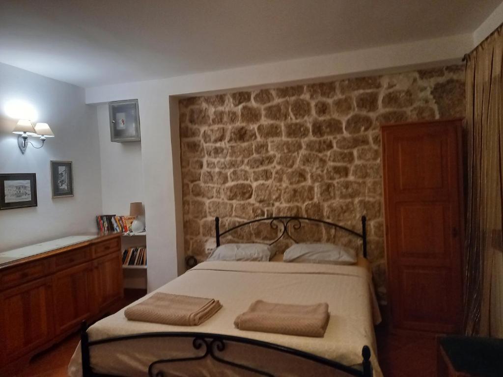 Postel nebo postele na pokoji v ubytování Apartment Katarina