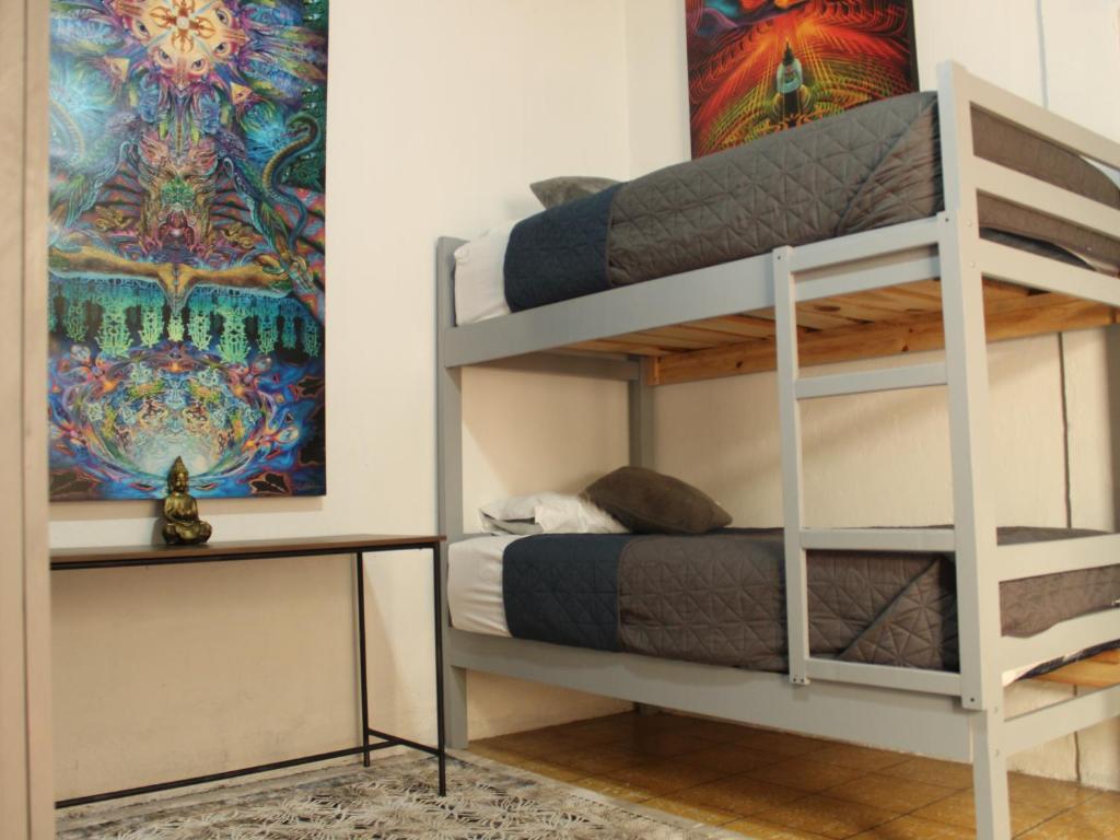 Postel nebo postele na pokoji v ubytování Hostal Centeno