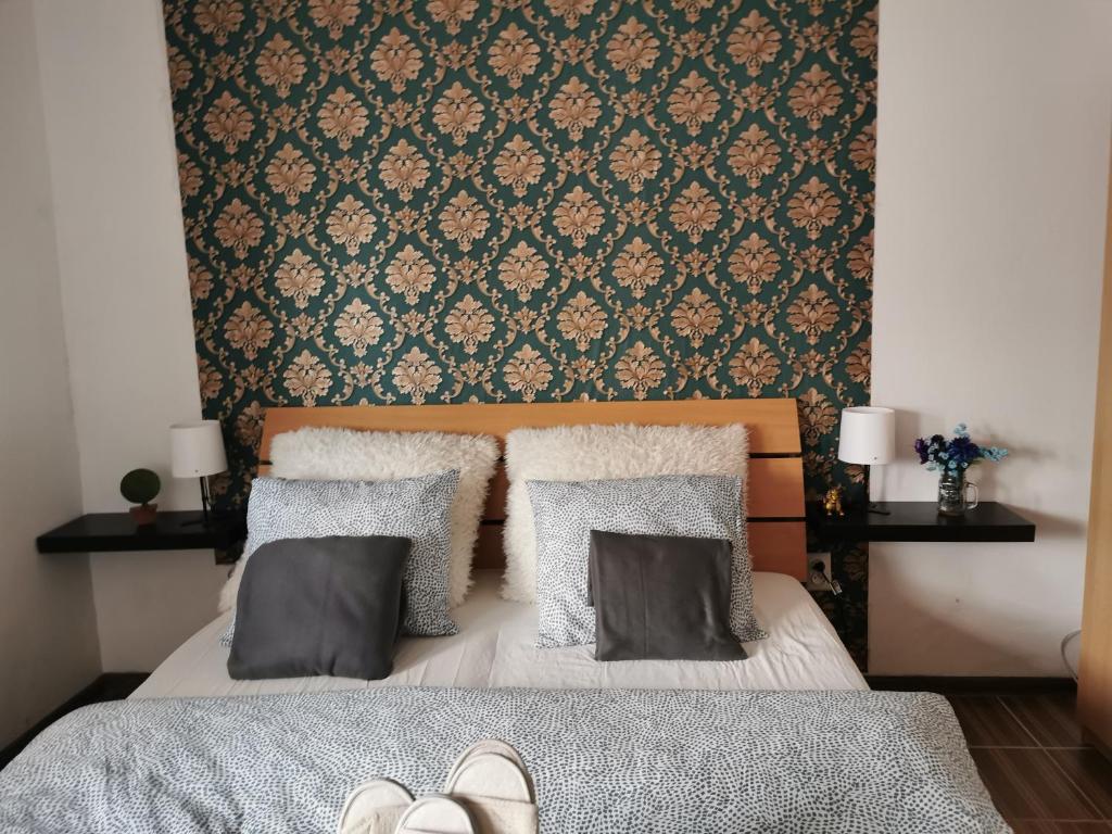 Postel nebo postele na pokoji v ubytování AG Apartment Gabčíkovo