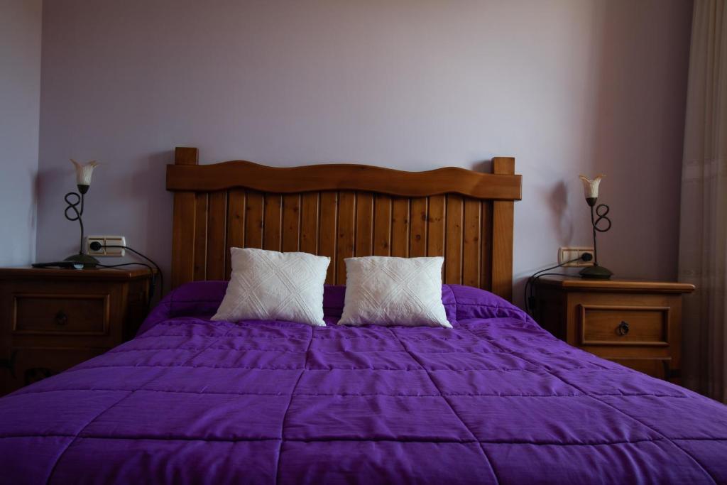 Postel nebo postele na pokoji v ubytování Tirontillana