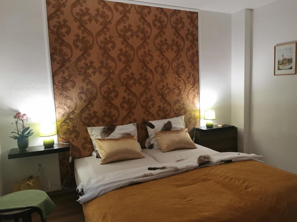 Postel nebo postele na pokoji v ubytování AG Apartment Gabčíkovo