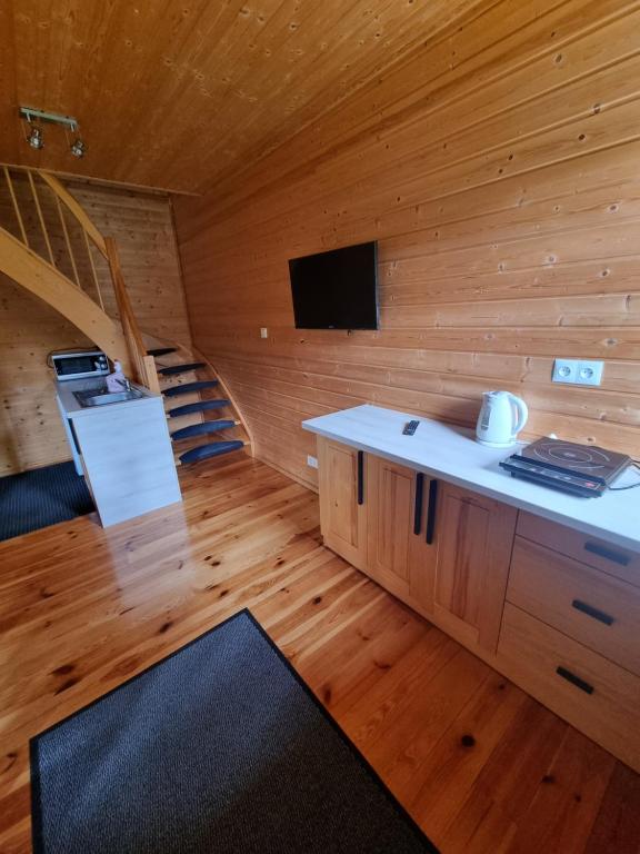 TV a/nebo společenská místnost v ubytování Cztery Pory Roku