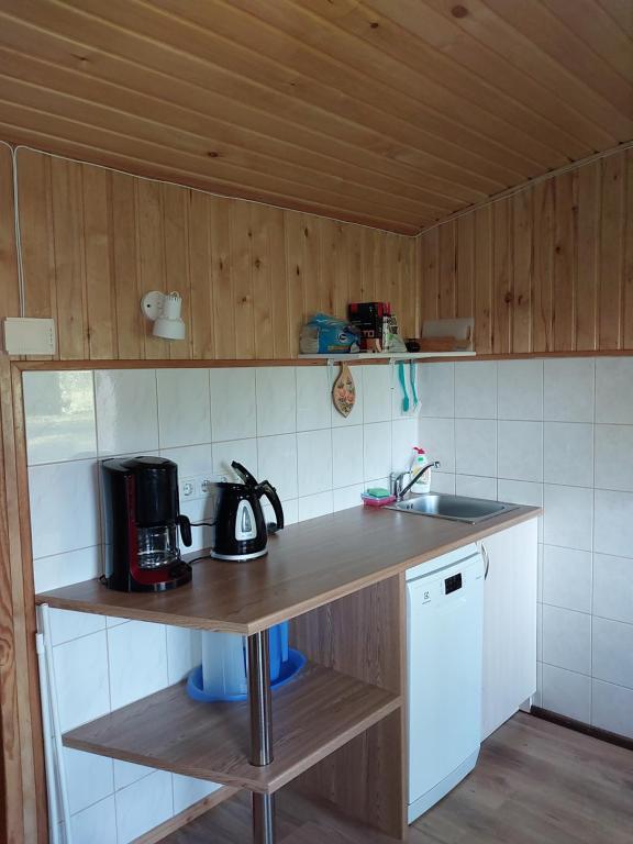 Kuchyň nebo kuchyňský kout v ubytování Treimani Puhkemaja