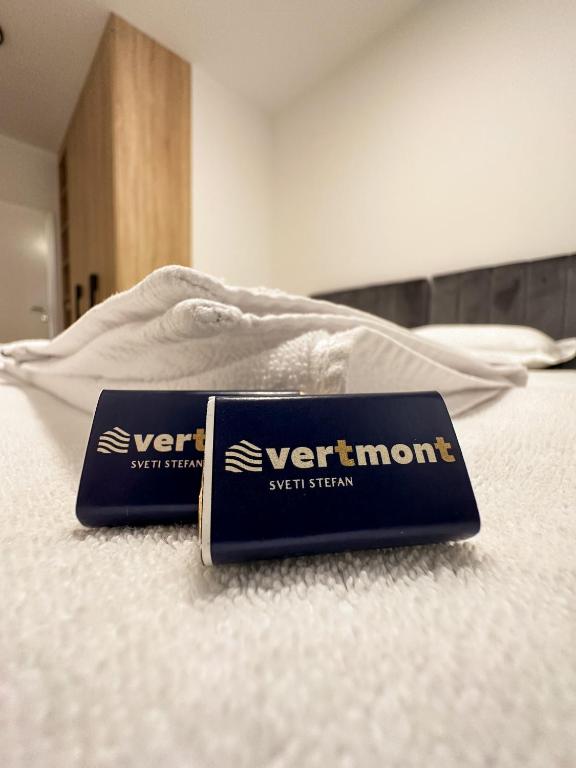 Postel nebo postele na pokoji v ubytování Vertmont Apartments
