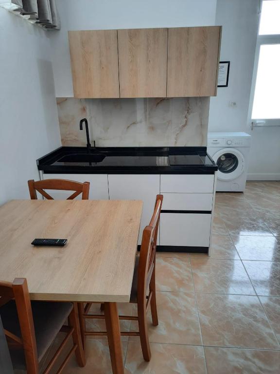 Kuchyň nebo kuchyňský kout v ubytování VILA PUSHIMI REGIS
