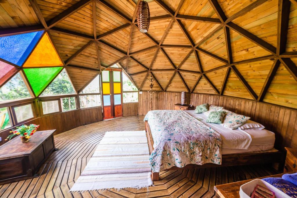 Postel nebo postele na pokoji v ubytování Tambo Eco Hotel