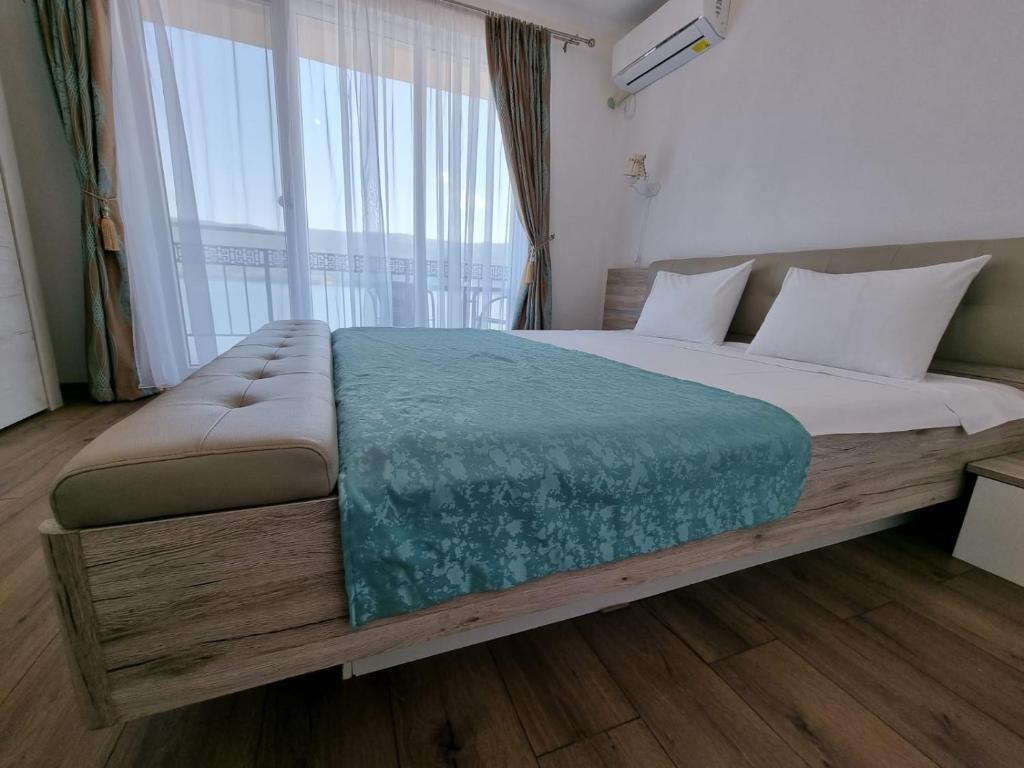 Postel nebo postele na pokoji v ubytování Casa Soarelui