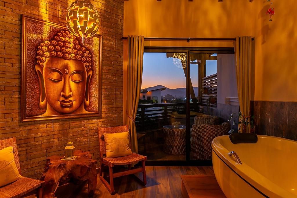 Uma área de estar em Shiva Boutique Hotel - Praia do Rosa