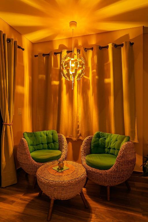 Uma área de estar em Shiva Boutique Hotel - Praia do Rosa