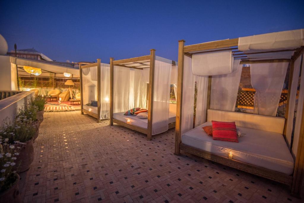 Postel nebo postele na pokoji v ubytování Hotel & Spa Riad El Walaa