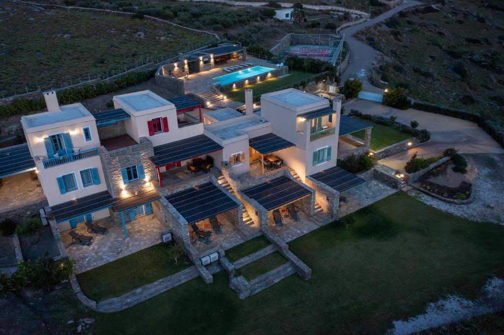 an aerial view of a house with a pool at Bella Resorts Andros in Andros