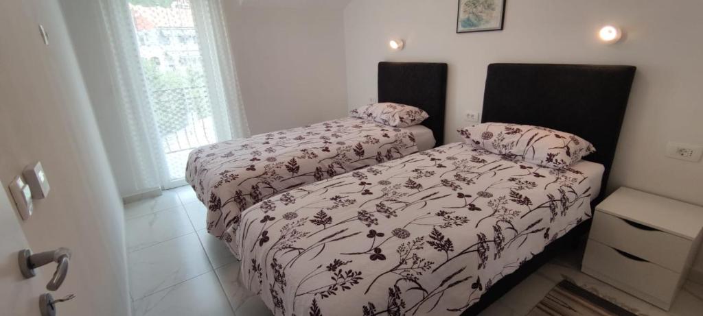 Voodi või voodid majutusasutuse Apartments INBOX toas